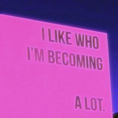 a pink sign that says, i like who i'm becoming a lot?