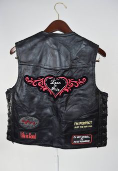 Vtg Black Leather Motorcycle Vest w Patches // Biker Babe, Love to Ride, Lady Rider // Badass Rock S Fitted Black Rocker Vest, Black Fitted Rocker Vest, Black Fitted Biker Vest, Fitted Biker Vest For Biker Events, Black Fitted Moto Vest, Biker Style Sleeveless Vest For Festivals, Biker Sleeveless Vest For Festivals, Edgy Black Vest For Biker Events, Fitted Biker Vest For Festivals