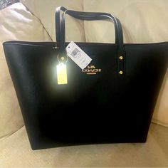 Coach Bag, Black With Beautiful Gold Accents. High-end Black Shopping Bags, Large Elegant Black Bag, Elegant Large Black Bag, Large Black Luxury Bag, Large Luxury Black Bag, Large Black Designer Bag, Elegant Large Black Shoulder Bag, Large Black Chic Bags, Elegant Large Bags With Large Capacity