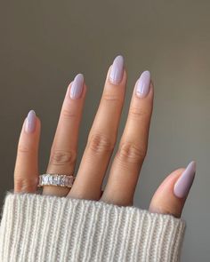 Alison • nailsbyalsn on Instagram: "i feel like THAT girl w this colour on 😙   @gelcare.official Lavender Bb Creme | discount code: NAILSBYALSN  Ring @treasurebox.jewelry | discount code: NAILSBYALSN  *affiliate  ———- #purplenails #lavender #gelnails #minimalnails #swatch #gelcare #nudenails #almondnails #nailinspo #cutenails #sophiarichienails #winternails" Lavender Nail Polish, Light Purple Nails, Lilac Nails, Pretty Nail Colors, Milky Nails, White Nail Designs, Nail Jewelry, Oval Nails