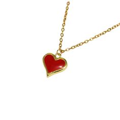 Minimalist red heart pendant! The delicate gold chain is the perfect complement to the sleek and modern red heart pendant, creating a beautiful and understated piece that is perfect for any occasion. The beauty of this necklace lies in its versatility, as it can be dressed up or down to suit any occasion or outfit. It's the perfect piece to add to your collection or to give as a thoughtful and heartfelt gift. Minimalist Red Heart-shaped Jewelry, Red Heart Pendant Necklace With Clavicle Chain, Red Heart Necklace With Clavicle Chain, Red Heart Clavicle Chain Necklace, Minimalist Red Heart Necklace, Red Heart-shaped Charm Necklace, Red Heart Charm Necklace With Clavicle Chain, Red Heart-shaped Clavicle Charm Necklace, Red Dainty Charm Necklace With Heart Charm