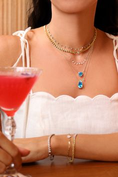 Summer cocktail with Blue Topaz Meira T Necklaces Diamond Teardrop Necklace With Gemstone Accents, Teardrop Diamond Necklace With Gemstone Accents, Diamond Teardrop Necklaces With Gemstone Accents, Yellow Gold Teardrop Blue Topaz Necklace, Pear-shaped Blue Topaz Necklace, Luxury Teardrop Blue Topaz Jewelry With Diamond Accents, Teardrop Blue Topaz Jewelry With Diamond Accents, Fine Jewelry Blue Topaz Briolette Necklace, Blue Topaz Briolette Necklace In Fine Jewelry Style