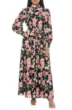 The Saliah mockneck blouson sleeve maxi dress is a classic staple piece for your wardrobe. This maxi dress features mockneck with shirring detail, dramatic blouson sleeves, elastic waist with waistband, and full maxi skirt. 55.5" length (size XS) Mock neck Back closure Long blouson sleeves Allover floral print Lined 97% polyester, 3% spandex Machine wash Imported Model stats: 5'10" height, 32" bust, 25" waist, 36" hip. Model is wearing size 4 Full Maxi Skirt, Daytime Dresses, How To Make Shoes, Maxi Dress With Sleeves, Staple Pieces, Dress Romper, Mock Neck, Modest Outfits, Sundress