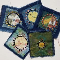 four pieces of cloth with different designs on them