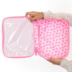 Details: Set of 3 rectangular pouches with secure zipper closure. Clear vinyl top with mesh. Small pouch: 10.5” L x 6” W x 4” H Medium pouch: 10.5” L x 8” W x 4” H Large pouch: 14.5” L x 8.5” W x 4” H Material and Care: Polyester cube with vinyl top lining. Spot clean only. Materials may have natural variations. Colors may vary from different viewing devices. Slippers Sold Separately Large Pouch, Small Pouch, Packing Cubes, Pink Daisy, Small Pouches, Clear Vinyl, Bubblegum Pink, Trendy Accessories, Weekender Bag