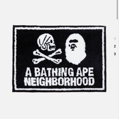 a bathing ape neighborhood rug with a skull and crossbones on it