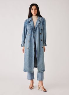 • Esmaee Midwest Trench Coat • Drop shoulder • Collared neck • Double breasted • Long sleeve • Front pockets • Removable waist belt • Calf length Style No: 2291.5563 Content: 100% Cotton Model height: 177cm / 5' 9½in | Model wears Size XS Cheap Denim Blue Single Breasted Outerwear, Luxury Relaxed Fit Denim Jacket With Pockets, Luxury Denim Jacket With Pockets For Workwear, Luxury Rigid Denim Outerwear With Pockets, Cheap Washed Blue Outerwear For Work, Luxury Washed Blue Outerwear For Work, Luxury Denim Utility Jacket For Work, Luxury Denim Jacket With Double-needle Sleeve For Work, Luxury Long Sleeve Denim Jacket For Work