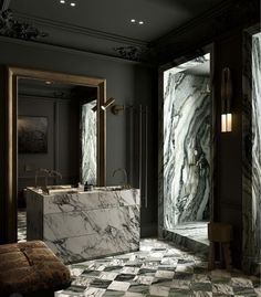 an elegant bathroom with marble floors and walls