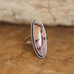 What is your favorite Jasper? Good luck! The more you get to know them the more beautiful they are. This Sonora Jasper Boho ring is a choose your own stone listing. Choose your stone from the drop-down below. We will make your ring in your stone and your size. The LBJ Sonora Jasper Boho Ring looks and feels like it could have been made by a master silversmith from another time and place. Simple, classic design with the .925 Sterling Silver twist wire and comfy split shank. It makes you feel like Silversmith Rings, Big Statement Rings, Chloe Ring, Purple Amethyst Ring, Purple Rings, Jasper Ring, Lapis Ring, Gold And Silver Rings, What Is Your Favorite