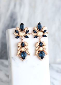 Blue Navy Earrings, Bridal Blue Navy Earrings, Dark Blue Chandeliers, Blue Rose Gold Earrings, Champagne Blue Earrings, Blue Long Earrings Glamorous Blue Chandelier Drop Earrings, Glamorous Blue Chandelier Earrings, Blue Glamorous Crystal Earrings For Formal Occasions, Blue Crystal Earrings For Formal Occasions, Blue Chandelier Earrings For Evening, Blue Chandelier Earrings For Evening With Pierced Ears, Glamorous Blue Drop Earrings, Glamorous Blue Jewelry With Matching Earrings, Elegant Blue Chandelier Earrings For Evening