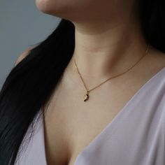 Introducing our Marlow Necklace, a testament to timeless elegance and refined minimalism. The marquise shape gracefully frames a CZ stone, adding a touch of sparkle and radiance. Its minimalistic style makes it perfect for any occasion. -stainless steel, gold plated -15.5" with 2" extender Elegant Everyday Crescent Charm Necklace, Elegant Gold Plated Jewelry With Moon Charm, Elegant Oval Pendant Stainless Steel Jewelry, Minimalist Oval Pendant Clavicle Chain Jewelry, Elegant Stainless Steel Oval Pendant Jewelry, Elegant Oval Stainless Steel Pendant, Elegant Oval Pendant Necklace With Moon Charm, Elegant Charm Necklace With Delicate Stainless Steel Chain, Elegant Crescent Charm Necklace With Delicate Chain