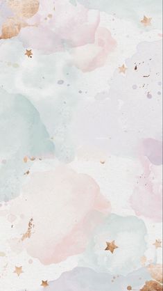 an abstract background with gold stars and pastel pinks on the bottom right corner