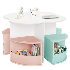 a white table with two storage bins underneath it and a book shelf on the other side