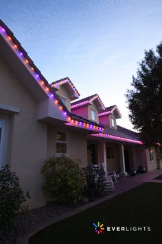 a house with christmas lights on the roof