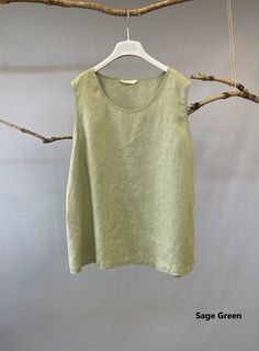 "Simple, relaxed and comfortable linen tank top. Can be worn un-tucked as lounge top or tucked as a chic tank top. * 100% Linen * Wide comfy straps * Scoop neck with back button closure * Straight silhouette * Fabric has been pre-washed to prevent shrinkage in the future * Matching shorts available https://www.etsy.com/listing/840638705/linen-shorts-women-ruffle-hem-shorts?ref=shop_home_active_1&frs=1&crt=1 Please provide your full bust measurement (measured around the fullest part) and Linen Lounge, Linen Camisole, Chic Tank Tops, Linen Shorts Women, Tank Top Shorts, Top Shorts Set, Cropped Linen Pants, Linen Fashion, Linen Tank Top