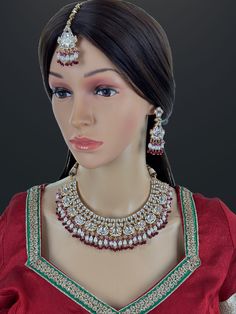 Bridal Ruby Red Fine Kundan Indian Bridal Necklace, Wedding necklace, Fine kundan jewelry, Pakistani Jewelry, Indian Jewelry, Bridal Jewelry Rose Gold-plated foiled Kundan necklace set.  Regular Size And Adjustable Ships from California, USA Delivery in 2-5 business days in the USA. Other designs can be found here https://www.etsy.com/listing/1381240765/premium-quality-gold-plated-silver?click_key=e1a9e46c1ba3dcb2d7ddeb00610b709b7497bd62%3A1381240765&click_sum=5b5797e9&ref=shop_home_active_511&pro=1&frs=1&sts=1 https://www.etsy.com/listing/1266279586/premium-quality-gold-plated-silver?click_key=ac3f9678a67e3cb7b0f157cdf3d63e11bd1206cf%3A1266279586&click_sum=258e6572&ref=shop_home_active_20&pro=1&frs=1&sts=1 https://www.etsy.com/listing/1269817669/emerald-gold-victorian-uncut-polki?ref=list Heavy Red Lehenga For Diwali, Red Kundan Traditional Wear With Stone Work, Traditional White Ruby Bridal Necklace, Traditional Red Kundan Tikka, White Ruby Necklaces For Wedding, Red Ruby Bridal Necklace For Reception, Red Meenakari Jewelry For Reception, Festive Traditional Kundan Necklace With Ruby, Traditional Red Jewelry For Reception