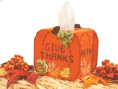 an orange box with the words glue thanks on it and some autumn decorations around it