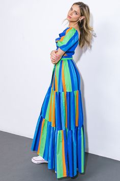 Indulge in the allure of our printed woven maxi dress. Adorn yourself in its square neckline, short puff sleeves, smocked bodice, self sash tie, and tiered skirt. Elevate your wardrobe with this sophisticated and exclusive piece.Details:Self : 100% CottonSize & Fit- Model is 5`8" And Wearing Size Small- Measurements Taken From Size Small- Approx. Length: 59" About Us: Welcome to Lizzie's! We hope you find unique pieces you'll love for years! We've been in the fashion business since 2016. You'll Holiday Tops, The Vibe, Maxi Dress Blue, Square Necklines, Tiered Skirt, Holiday Dresses, Business Fashion, Square Neckline, Sequin Dress