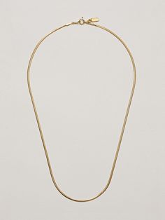 Editor's NotesManaet presents unique accessories that exude the brand's identity in a creative way. - Modern minimal silver snake chain necklace- Unique curved line point- Smooth and glossy surface- Unique and stylish mood- Daily point item Measurements(in.)- One Size 16.5in. Composition & Care- Material: Silver 925- Plated products may discolor over time due to their nature.- Please be careful that discoloration may proceed faster in chemical substances, water, and Everyday Snake Chain Necklace, Minimalist Snake Chain Necklace With Box Chain For Everyday, Minimalist Snake Chain Herringbone Necklace For Everyday, Minimalist Herringbone Necklace With Snake Chain For Everyday, Modern Metal Snake Chain Necklace As Gift, Modern Metal Snake Chain Necklace Gift, Metal Snake Chain Necklace, Minimalist Everyday Herringbone Snake Chain Necklace, Modern Snake Chain Necklace For Everyday