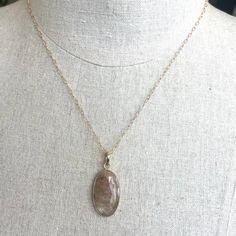 I was so thrilled to find a natural golden rutilated quartz pendant at a vendor's showroom recently. It is so interesting to look into the stone and see what's going on. The pendant bezel is 18k gold plated over 925 sterling silver. This very unique faceted pendant in gold filled setting and chain with a 14k gold filled chain with 14k gold filled lobster clasp closure and 24k gold vermeil ring. Shown is the 20" chain. Please choose your necklace length, or the default of 20” will be sent. What I Gold Citrine Jewelry In Oval Cabochon Shape, Oval Smoky Quartz Jewelry For Gift, Yellow Gold Smoky Quartz Jewelry Gift, Smoky Quartz Yellow Gold Jewelry Gift, Elegant Gold Smoky Quartz Necklace, Gold Smoky Quartz Gemstone Jewelry, Gold Smoky Quartz Necklace For Gift, Rutilated Quartz Necklace, Golden Rutilated Quartz