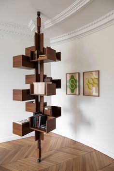 a book shelf in the corner of a room