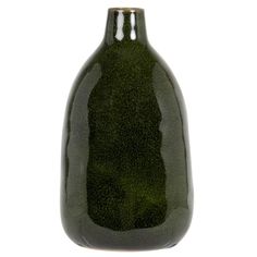 a dark green vase sitting on top of a white table