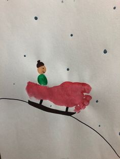 a child's drawing of a person on a sled