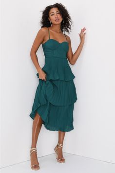 Get ready to be swept away to a world of romance by the Lulus Cascading Crush Emerald Green Tiered Bustier Midi Dress! Lightweight pleated woven fabric shapes adjustable spaghetti straps that support a bustier-style bodice with seamed cups. A fitted waist tops a tiered skirt that ends at a midi hem. Hidden back zipper/clasp. Fit: This garment fits true to size. Length: Mid-calf length. Size medium measures 44" from top to bottom. Bust: Great for any cup size. Waist: Fitted - very fitted at natur Semi Formal Midi Dresses, Bustier Midi Dress, Black Floral Print Dress, Cocktail Dress Wedding Guest, Lulu Fashion, Green Midi Dress, Midi Dress Sleeveless, Tiered Skirt, Cup Size