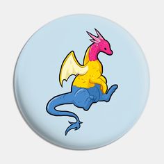 a blue and yellow dragon sitting on its back