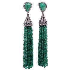 Life in color Collection Natural Emerald Slice wrapped in diamonds and featured Emerald tassel beads dangling from a crown cup set in blackened Sterling Silver. Emerald: 12.24ct total weight. Diamond: 0.81ct total weight. Luxury Evening Jewelry With Tassels, Elegant Beaded Fringe Jewelry, Luxury Dangle Tassel Jewelry, Luxury Formal Tassel Jewelry, Elegant Jewelry With Tassels And Round Beads, Elegant Round Beaded Tassel Jewelry, Bead Tassel Earrings, Tanzanite Earrings, Beaded Tassel Earrings