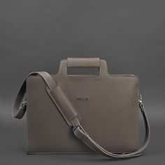 An original bag for a laptop and documents will emphasize the status and style of the owner.The bag is made of high-quality genuine leather. Strong textile lining inside. All seams are sewn by hand with strong threads.The bag has one large compartment and a pocket for a laptop with a strap to fix the device. There are also two internal pockets for small items.It is convenient to carry the accessory in the hand or on the shoulder. A long leather shoulder strap is included.Such a bag will be a gre Rectangular Laptop Bag With Leather Handles For Work, Luxury Laptop Bag With Shoulder Strap, Modern Shoulder Bag With Laptop Sleeve, Classic Laptop Bag With Top Handle And Laptop Sleeve, Classic Leather Laptop Bag With Sleeve, Luxury Satchel Shoulder Bag With Laptop Sleeve, Leather Shoulder Laptop Bag With Luggage Sleeve, Luxury Shoulder Bag With Laptop Sleeve, Leather Laptop Shoulder Bag With Luggage Sleeve