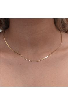 Build out your necklace stack or style solo with this slinky snake chain masterfully crafted in Italy from polished sterling silver or 18-karat-gold plate. 16" chain length, 2" extender Sterling silver or sterling silver/18k-gold plate Made in Italy Tiny Initial Necklace, Snake Necklace Gold, Benetint Lip Stain, Mederma Scar Cream, Anthelios Sunscreen, Necklace Stack, Snake Chain Necklace, Snake Necklace, Domed Ring