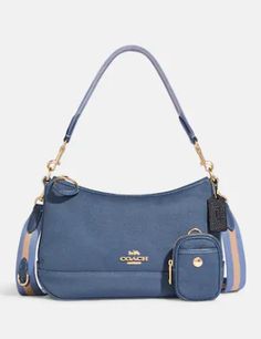 Canvas and refined pebble leatherShoulder bag:Inside zip and multifunction pocketsZip-top closure, fabric liningDetachable handle with 8 3/4" dropDetachable strap with 17 3/4" drop for shoulder or crossbody wear10 1/4" (L) x 7" (H) x 4" (W)Removable coin case:Zip closure, fabric liningOutside snap pocket2 1/2" (L) x 3 3/4" (H)Style No. CA626Color: Midnight Multi Multi Pocket Bag, Denim Crossbody, Vintage Coach Bags, Gold Bag, Coach Outlet, Coach Crossbody, Pretty Bags, Coach Purses, 7 H