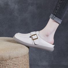 Gender: Women Type: Mules Main Materials: Cowhide Insole: Sheepskin Sole: Rubber Type of Closure: Slip-on Style: Daily. Casual. Retro Season: Spring. Summer. Autumn Heel Height: Low (2.5 cm) Cream Leather Flat Slip-ons, Beige Flat Bottom Slip-ons, Beige Leather Flat Slip-ons, Beige Mules With Leather Footbed And Round Toe, Beige Leather Slip-ons With Round Toe, Beige Slip-on Mules With Round Toe, Beige Mules With Buckle Closure And Round Toe, Beige Round Toe Mules With Buckle Closure, Faux Leather Slip-on Mules With Leather Footbed