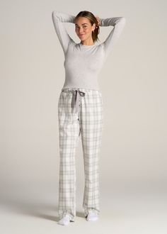 About Our Women’s Tall Flannel Pajamas You’ll never want to get out of bed when you’re wearing these women’s tall pajama pants. For years, tall women have had to settle for PJs that are way too short and fit in all the wrong places, but not anymore. You loved our classic flannel PJs and now we’re bringing you a pair with a regular fit and an open-bottom leg with all the length you need. These pajama pants have been designed exclusively for women between 5’9” and 6’6” with two different length op White Pajamas Women, Plaid Pjs Outfit, Pj Pants Aesthetic, Pyjamas Aesthetic, White Pajama Pants, Sleepwear Aesthetic, Pajama Pants Outfit, Fuzzy Pj Pants, Plaid Pjs