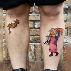 two people with tattoos on their legs, one has a cat and the other has a dog