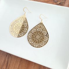 Camilla is our classic intricate style that is sure to become a wardrobe staple. The delicate details make this versatile design simply unique. 18K gold-plated hypoallergenic stainless steel hooks 18k gold-plated laser cut stainless steel drops Gold Stainless Steel Pierced Earrings, Gold Hypoallergenic Metal Earrings, Teardrop-shaped Gold Plated Filigree Jewelry, Gold Plated Filigree Teardrop Jewelry, Elegant Hypoallergenic Gold Plated Teardrop Earrings, Gold Stainless Steel Drop Earrings, Gold Teardrop Stainless Steel Jewelry, Pierced Yellow Gold Stainless Steel Earrings, Gold-tone Teardrop Earrings