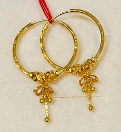 Dangling jimiki styles bali rajkot earrings Gold purity: 916 gold Hallmark: 916 stamped Appx Weight : 3.50 - 3.60grams Size: pls see picture with ruler Design : 25mm beautiful dangling jimiki bali Earrings. Similar random design depending on stocks availibility  FAQs Q: Is it real gold? A: yes it's real authentic genuine 916 gold Q: can pawn? A: yes it's pawnable ⭐GoForGold⭐ Luxury 22k Yellow Gold Chandbalis, Luxury Gold Chandbalis For Eid, Luxury Yellow Gold Plated Chandbalis, Luxury Gold Plated Chandbalis For Festivals, Elegant 22k Gold Chandbalis Luxury, Luxury Yellow Gold Chandbalis For Festivals, Luxury Round Gold Plated Danglers, Gold Hoop Earrings With Latkans For Festivals, 22k Gold Hoop Earrings With Intricate Design For Festivals