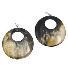 Discover the elegance of our Handcrafted Watusi Cattle Horn Domed Earrings. Featuring a unique cutout center and .925 sterling silver posts, these earrings are designed for women who appreciate natural beauty and ethical craftsmanship. Each piece is meticulously crafted from ethically sourced Watusi cattle horn, showcasing its natural variations and stunning hues. Perfect for adding a touch of nature’s artistry to your jewelry collection, these earrings combine timeless elegance with modern desi Elegant Carved Round Earrings, Elegant Round Carved Earrings, Artisan Black Drop Earrings, Black Artisan Drop Earrings, Black Artisan Jewelry With Polished Finish, Artisan Black Jewelry With Polished Finish, Artisan Black Earrings As Gift, Artisan Black Earrings For Gift, Artisan Black Earrings Gift