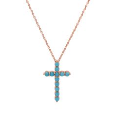 This modern Turquoise Cross necklace is handset in 14K Solid Gold with vibrant mm natural Turquoise. The Cross brings hope and faith to many and turquoise is a stone know to bring luck, peace and protection. Wear it as a reminder of strength and love. Pairs beautifully with our Turquoise Bead Bar Necklace.

Size: 25mm(H) x 15mm(W)
2.5mm Turquoise beads
Solid 14K Gold
Lifetime Guarantee
Made in Los Angeles
Due to the nature of Turquoise, color may vary Turquoise Cross Necklace, Bead Bar Necklace, Engagement Necklaces, Christmas Engagement, Gift For Anniversary, Bead Bar, Turquoise Cross, November Birthstone, Wedding Jewellery Necklace