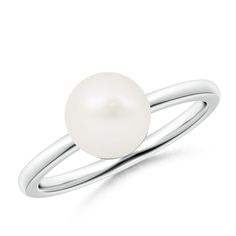 Set on silver band is a Freshwater pearl glowing magnificently. The glossy round pearl resembles the full moon and captivates the senses with its sheer elegance. It's a classic pearl ring that accessorizes well with every outfit. Formal White Pearl Ring, White Pearl Drop Ring For Formal Occasions, Classic White Gold Pearl Drop Ring, Classic White Gold Pearl Ring With Pearl Drop, Classic Pearl Drop Ring, Classic Pearl Ring With Pearl Drop, Classic White Pearl Ring With Pearl Charm, Classic Round Pearl Ring With Pearl Drop, Classic White Pearl Ring With Charm