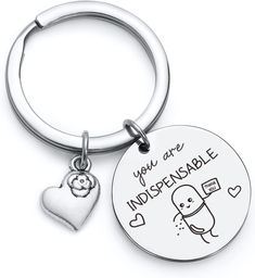 a metal keychain with a heart and an ice cream cone on it that says, you are indspensable