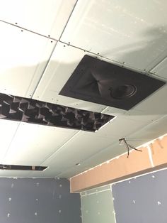 the ceiling is covered in holes and screws