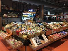 a display in a store filled with lots of food