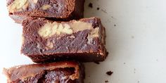 several pieces of brownie sitting on top of each other