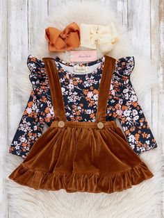 Fall in love with fall fashion with this Black & Bronze Floral Velvet Ruffle Overalls Outfit! Little fashionistas will be styling and profiling in this adorable set - featuring a ruffle long-sleeved top with floral detailing, and a bronzy velvet overall skirt. All you need now is an apple orchard (or a playdate) to get the cuteness meter up to maximum! Shop the matching collection here! Fits true to size. 95% Polyester / 5% Spandex. Accessories sold separately. Suggest bow color #4 or #47. Impor Mother Hood, Beach Bathroom, Overall Skirt, Overalls Outfit, Pinterest Ideas, Apple Orchard, Toddler Clothes