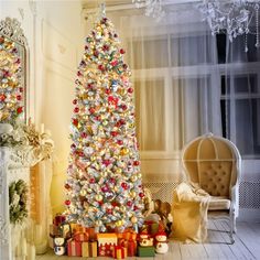 a decorated christmas tree in a living room with presents on the floor next to it