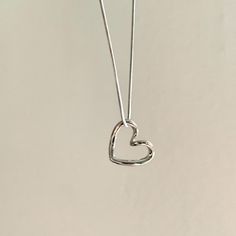 - This simple sweet style necklace is made of stainless steel chain, and stainless steel heart pendant. - Great for bestie necklaces.  - Stainless steel, tarnish free.  - Super simple and dainty, goes well with all your outfits! - length:  15 inches +2 inches of extender chain.  -  -Shipping: All orders will be shipped out within 1-2 business days after the order has been received. Ship from New York, United States. USPS first class mail on this order. 🚗 - Thank you for visiting my listing. - For more cute necklaces: https://www.etsy.com/shop/Funbeadsbygrace1?ref=dashboard-header&section_id=50341900 -  Follow us on Instagram: funbeadsbygrace for more beautiful creations and updates on the shop! Minimalist Nickel-free Heart Pendant Necklace, Minimalist Nickel-free Necklace For Valentine's Day, Minimalist Heart-shaped Metal Charm Necklace, Minimalist Metal Heart Pendant Necklace, Silver Open Heart Clavicle Chain Necklace, Everyday Metal Heart Pendant Charm Necklace, Silver Stainless Steel Necklace With Heart Charm, Stainless Steel Heart Charm Pendant Necklace, Everyday Metal Charm Necklace With Heart Pendant