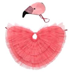 a pink flamingo fan with a black bird on it's head and a white background