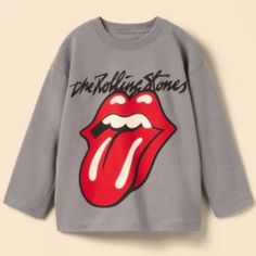 Zara Rolling Stones Gray Long Sleeve Graphic Tee Crew Neck Grey Gender Neutral Kids / Toddler 2-3 Years Excellent New Condition - Never Worn Questions? Leave A Comment Below! Graphic Band Tee Pullover Crewneck Neutral Trendy Letter Print Tops For Playtime, Graphic Print Tops For Playwear In Fall, Winter Letter Print Top For Playwear, Winter Tops With Letter Print For Playwear, Unisex Graphic Print Tops For Playwear, Winter Cotton Tops By Zara, Zara Cotton Tops For Winter, Cotton T-shirt For Playwear In Fall, Cute Zara Tops For Fall